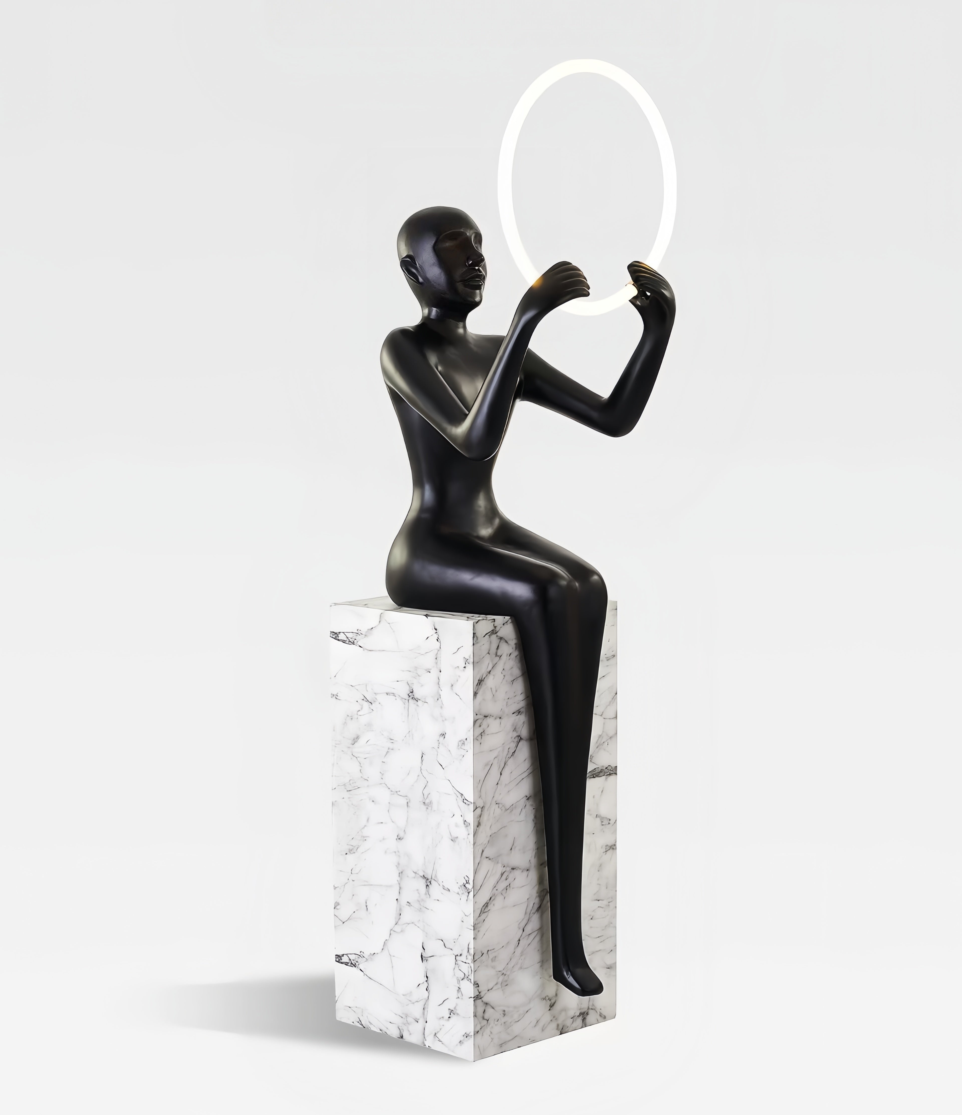 Hand held circular abstract sitting posture statue floor lamp